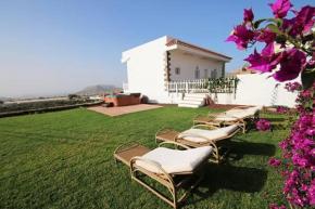 Отель Villa Albe, jacuzzi con vistas al mar  Арона